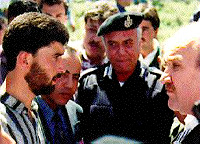 Photo: Student leader Khalid Barghoutti and Ramallah governor Mustapha 'Issa.